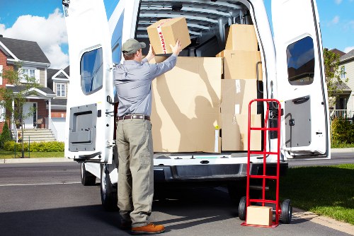 Moving truck parked in Paddington with packed boxes